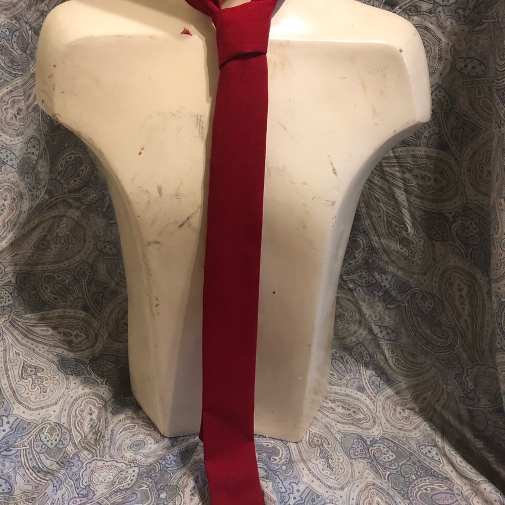 Red cloth skinny tie likely from Hot Topic